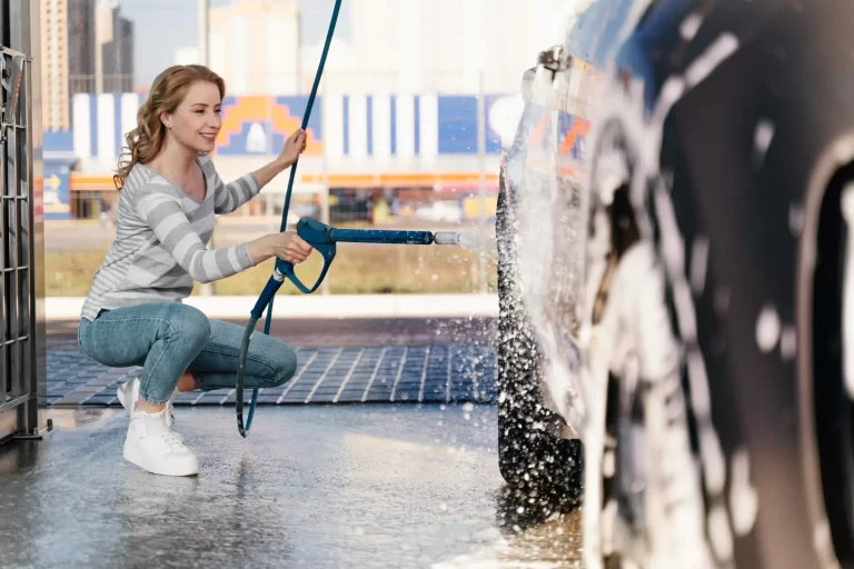 woman-washing-her-car-outdoors