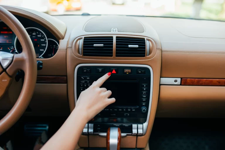1-car-dashboard-radio-closeup-woman-sets-up-radio